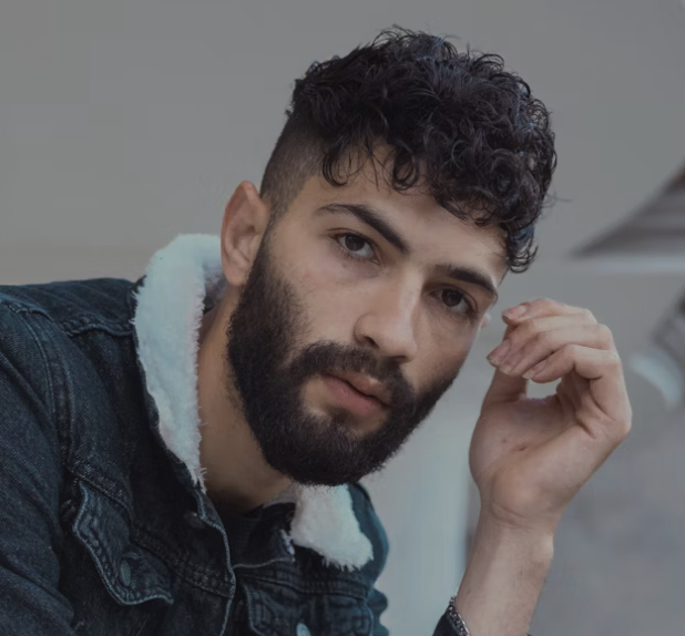 Man adjusting black frame sunglasses